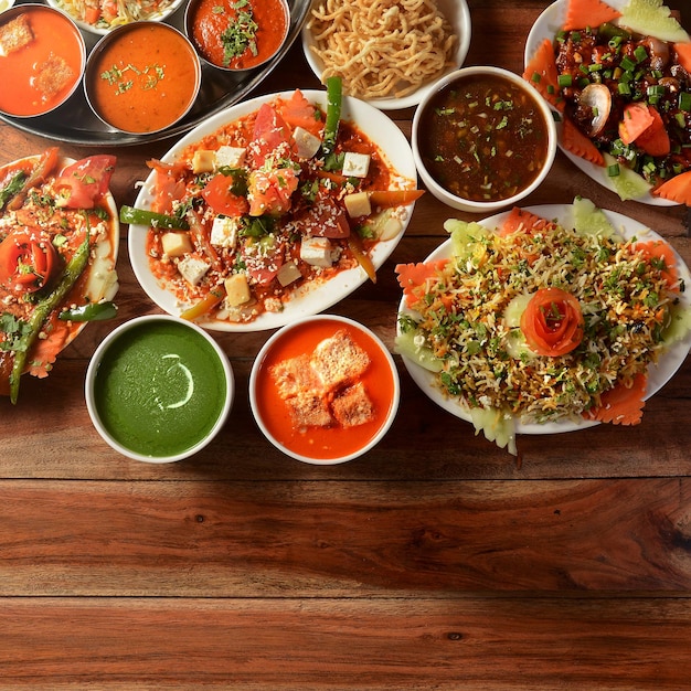 assorted indian food on wooden background dishes and appetizers of indian cuisine