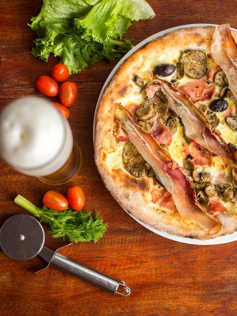 Assorted Meat pizza with jamon and olives