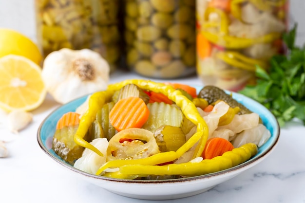 Assorted mixed pickled vegetables in bowl - plate, Turkish name; tursu.