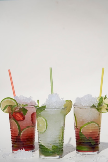 Assorted mojito glass with fresh fruit closeup