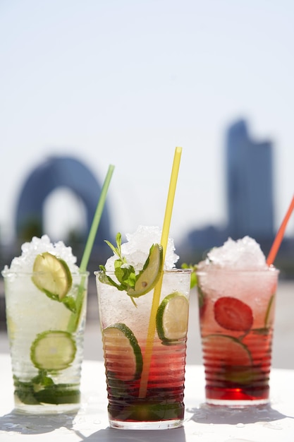 Assorted mojito glass with fresh fruit closeup