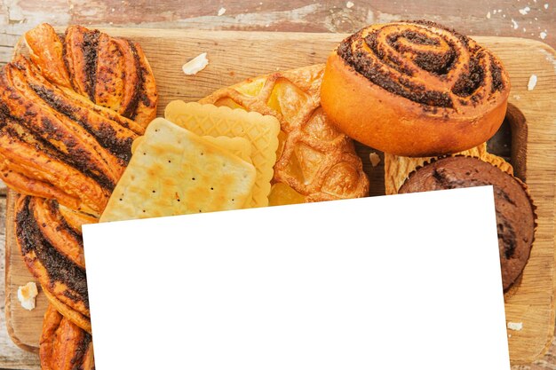 Assorted pastries on a vintage style wooden backdrop