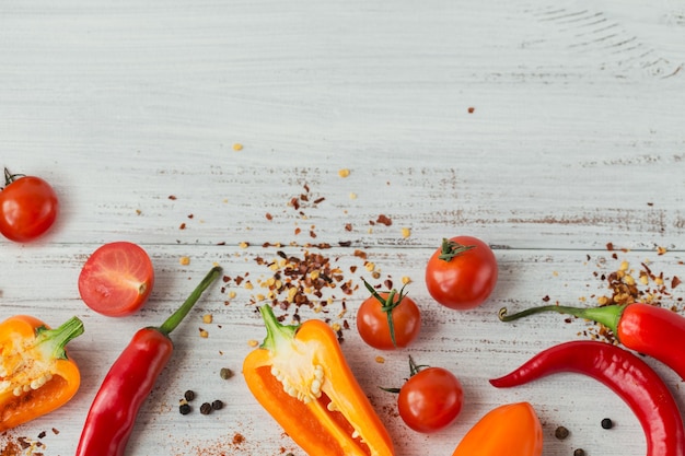 Assorted peppers, cherry tomatoes and spices