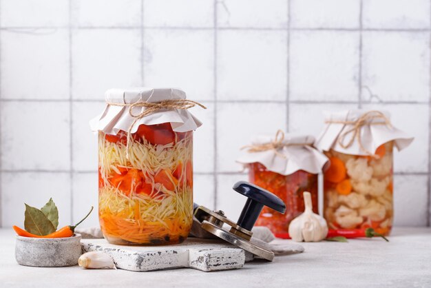 Assorted of pickled vegetables in jars