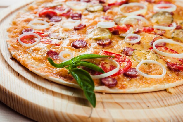 Assorted Pizza on the wooden table