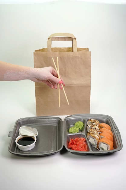 Assorted sushi rolls on an isolated white background