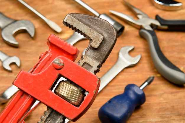 assorted tools in grunge wood used by worker