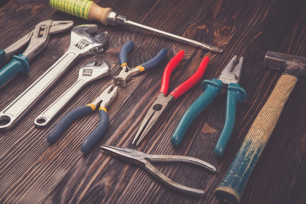 Assorted work tools on wood