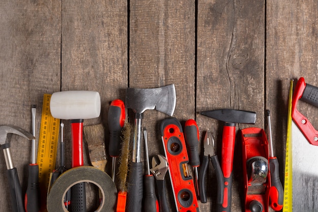 Assorted work tools on wood