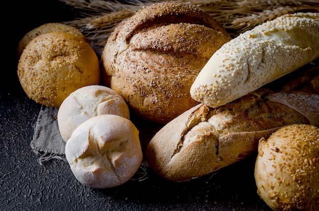 Assortment of baked goods in black background