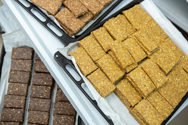 Assortment of cereal or protein bars that leave the assembly line at the factory