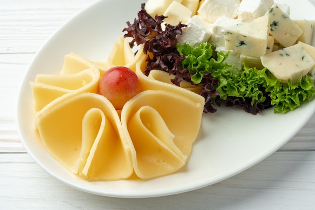 Assortment of cheese on a white plate