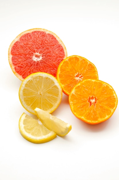 Assortment of citrus on white surface