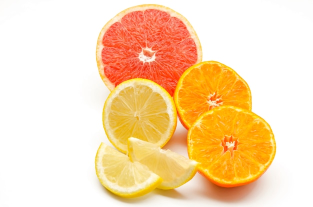 Assortment of citrus on white surface