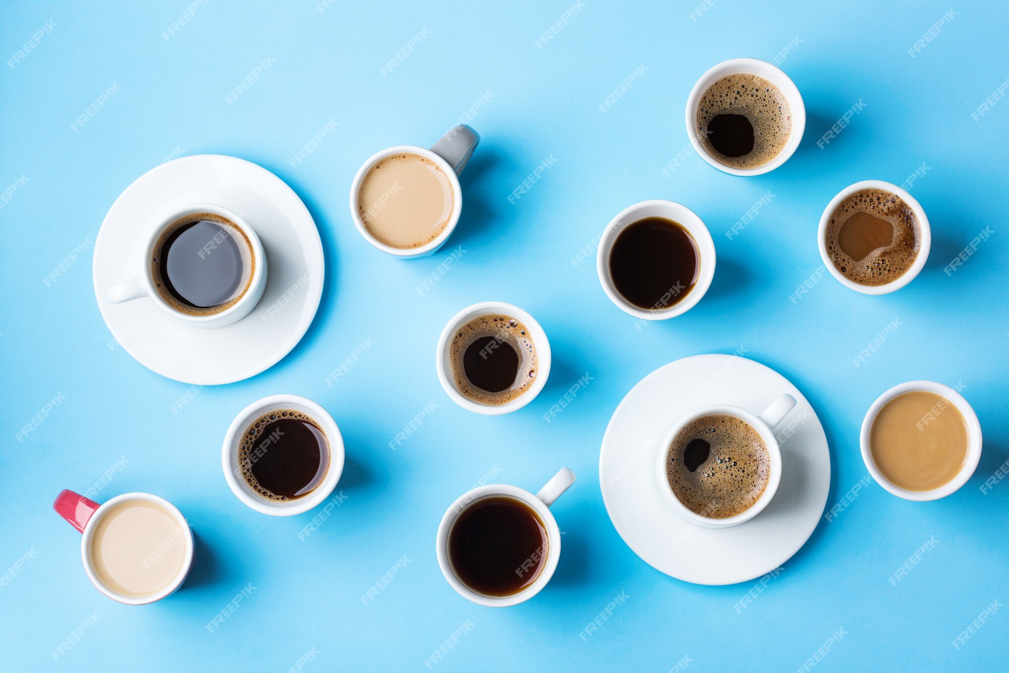 https://img.freepik.com/premium-photo/assortment-coffee-cups-mugs-with-black-roasted-americano-cappuccino-milk-blue-background-creative-trendy-flat-lay_419307-1971.jpg?w=2000