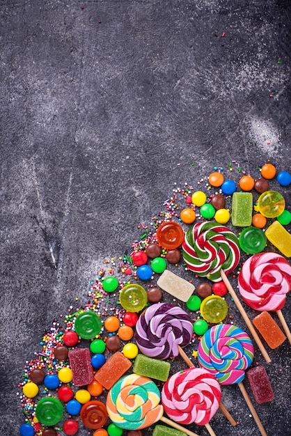 Photo assortment of colorful candies and lollipops