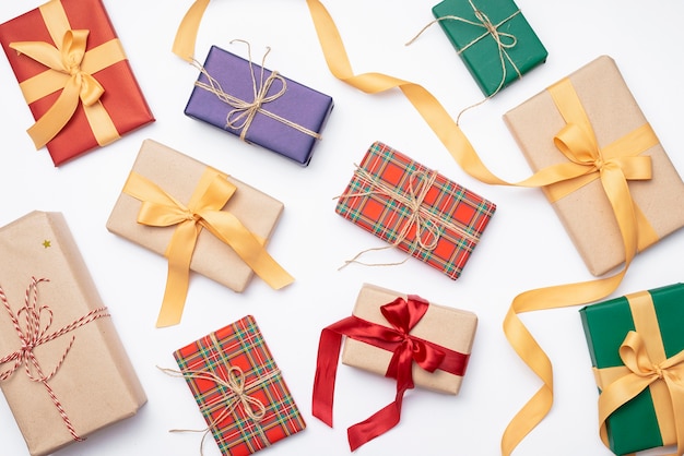 Assortment of colorful christmas presents with ribbon