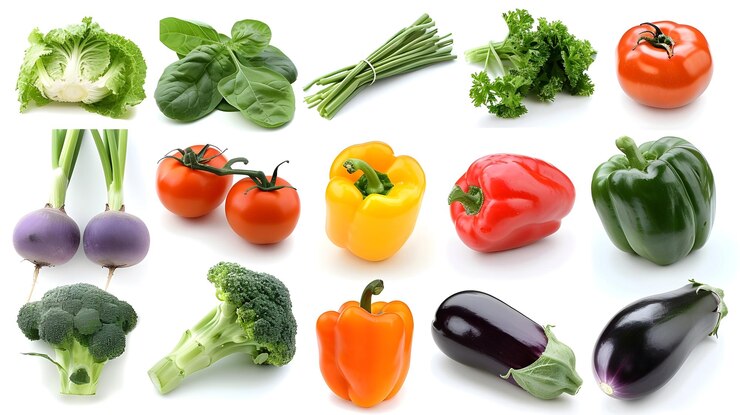 Assortment of Colorful Fresh Organic Vegetables and Produce on White Background