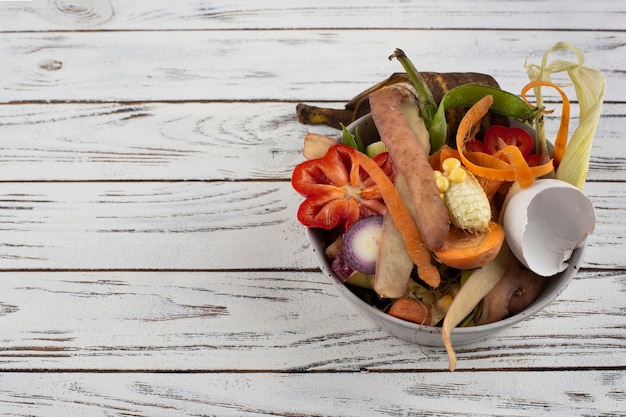 Photo assortment of compost made of rotten food with copy space