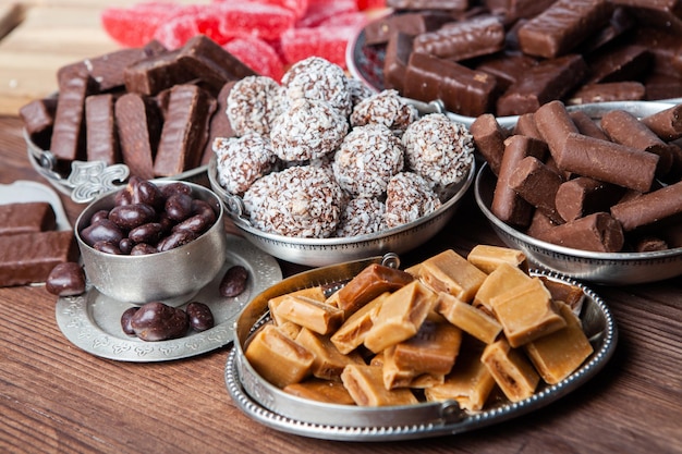 Assortment of delicious chocolate candies background