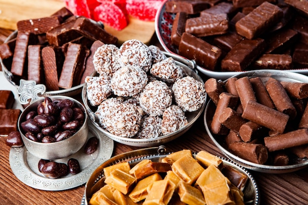 Assortment of delicious chocolate candies background