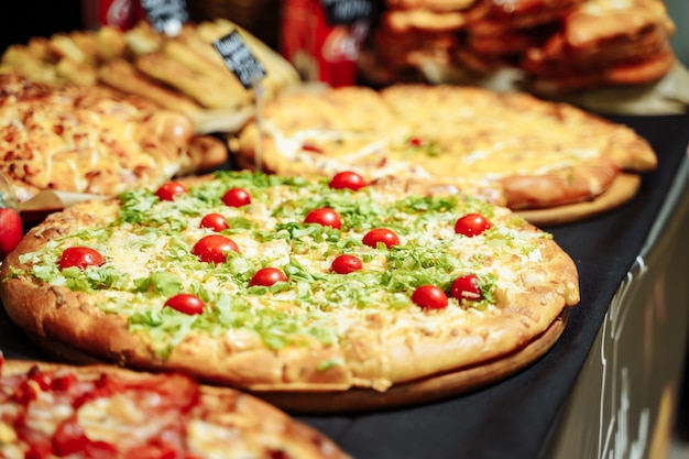 Assortment of delicious Italian pizzas in the restaurant