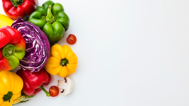 Assortment of different fresh vegetables with copy space