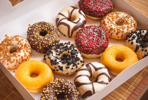 Assortment of donuts of different flavors in a box