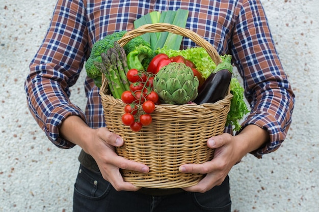 Assortment or farmer market bio organic ripe vegetables in hands