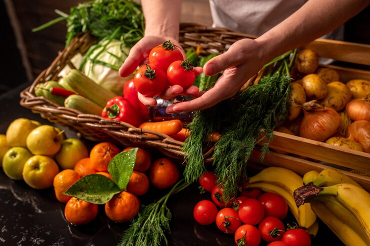 Photo assortment of fresh vegetables and fruits on wooden table
