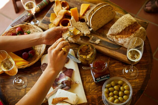 assortment of freshly baked bread with napkin on rustic table top view