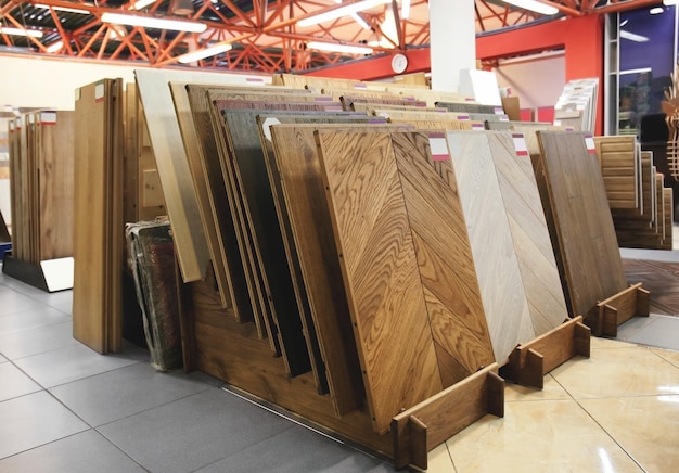 Assortment of laminated flooring samples in hardware store