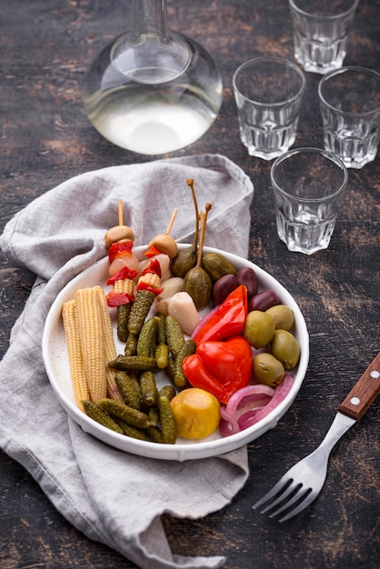 Assortment of marinated or pickled vegetable.