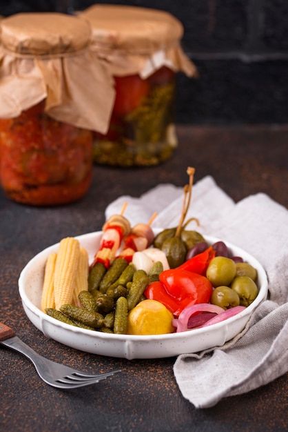 Assortment of marinated or pickled vegetable.