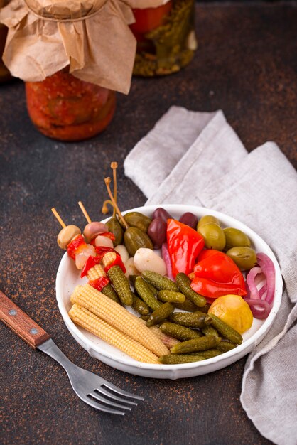 Assortment of marinated or pickled vegetable.