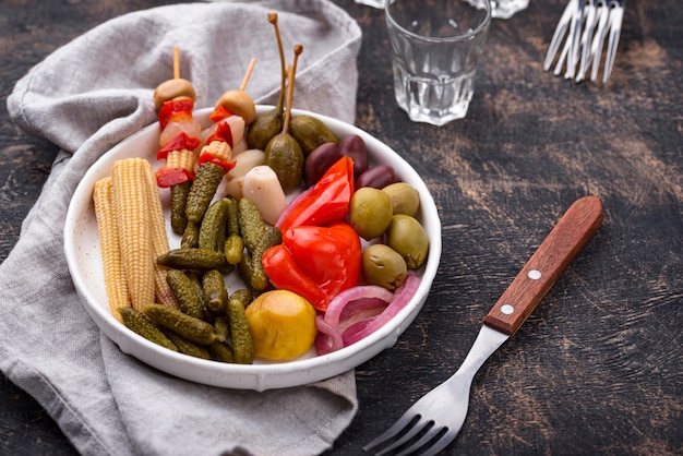 Assortment of marinated or pickled vegetable.