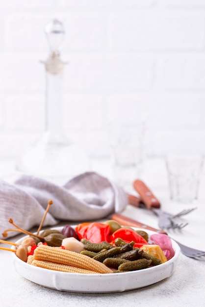 Assortment of marinated or pickled vegetable.