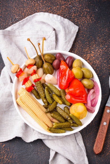 Assortment of marinated or pickled vegetable.