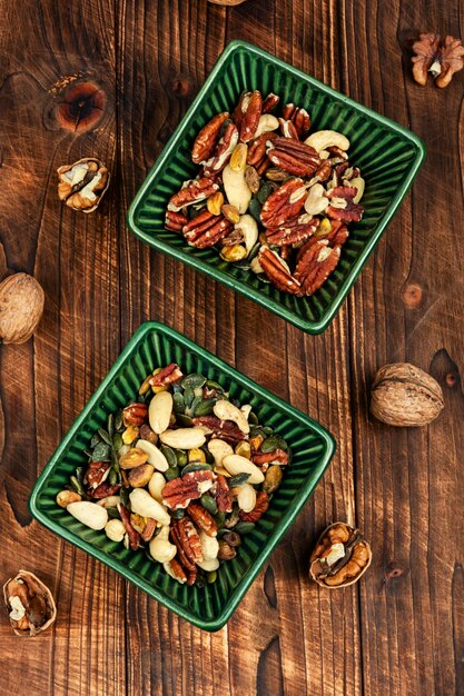 Assortment of nuts on wooden backgrounds