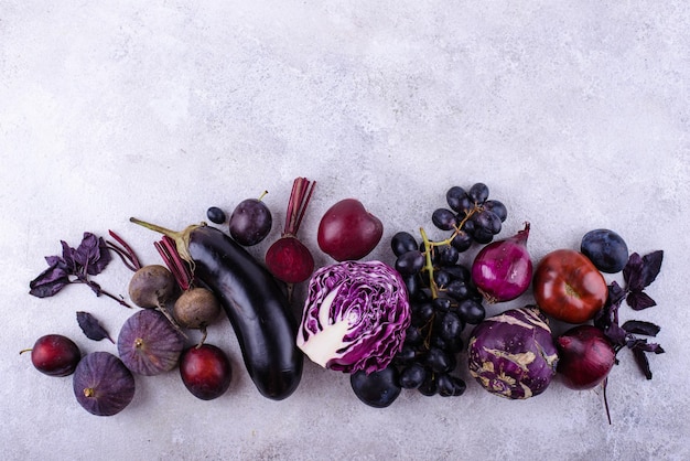 Assortment of purple vegetables and fruits