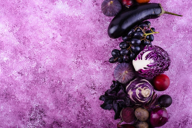 Assortment of purple vegetables and fruits