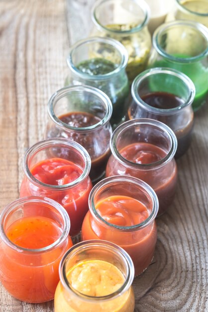 Assortment of sauces in the glass jars