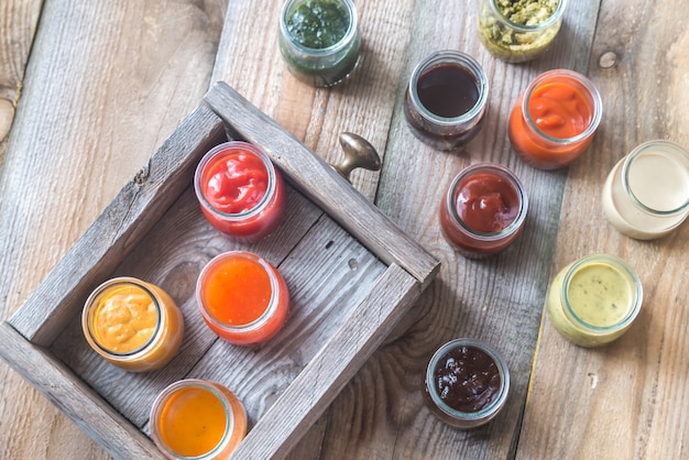 Assortment of sauces in the glass jars