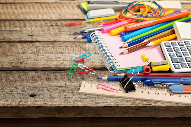 Assortment  of School supplies on  background