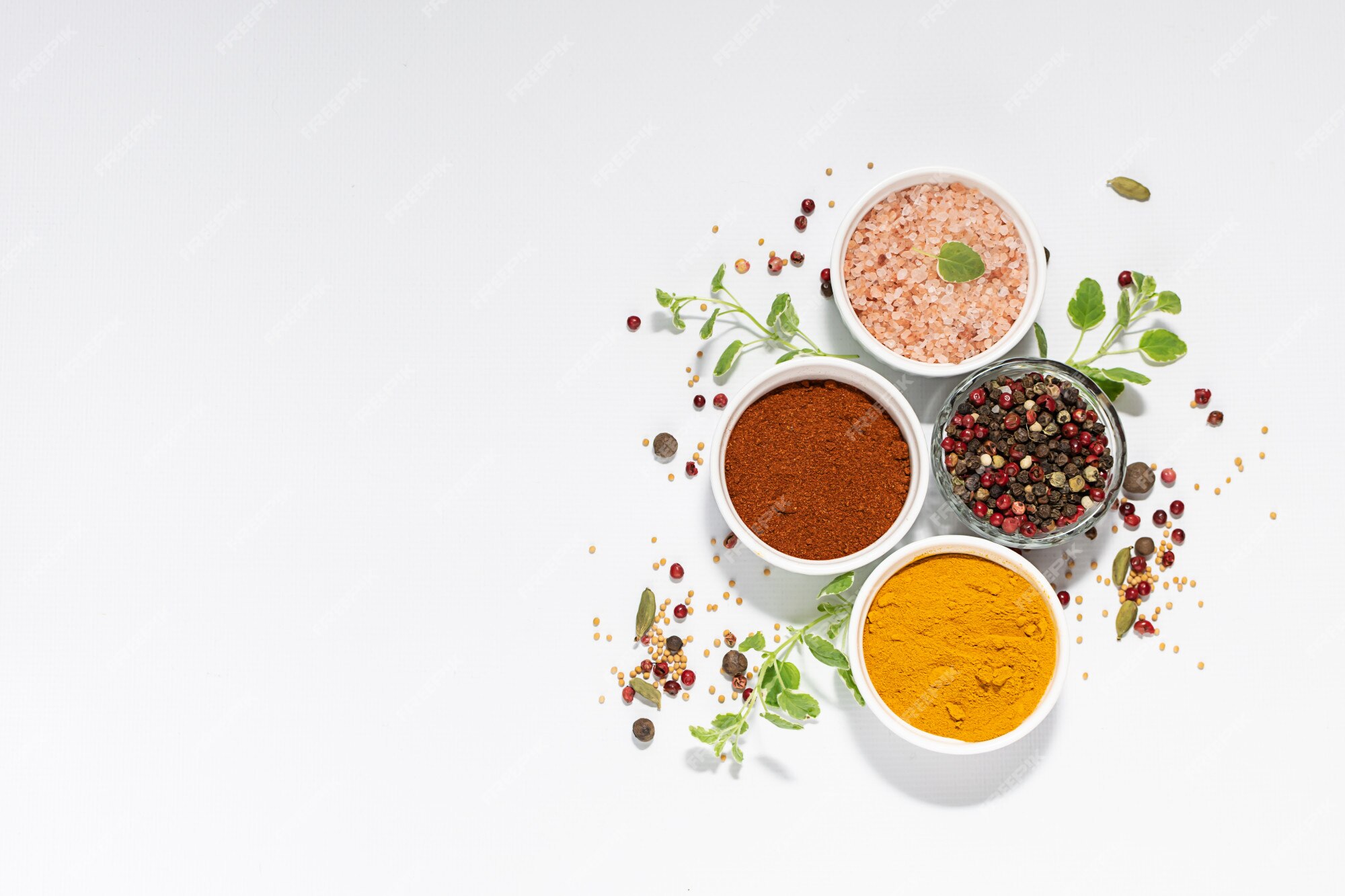 Premium Photo | Assortment of spices and herbs on white background