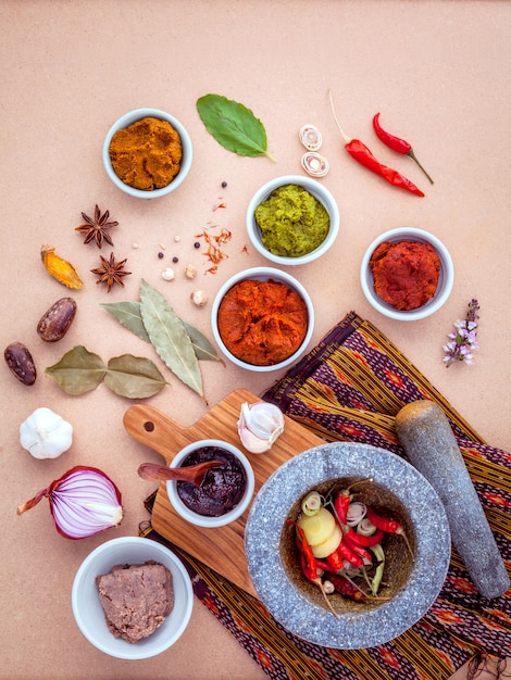 Assortment of Thai food cooking ingredients and paste .