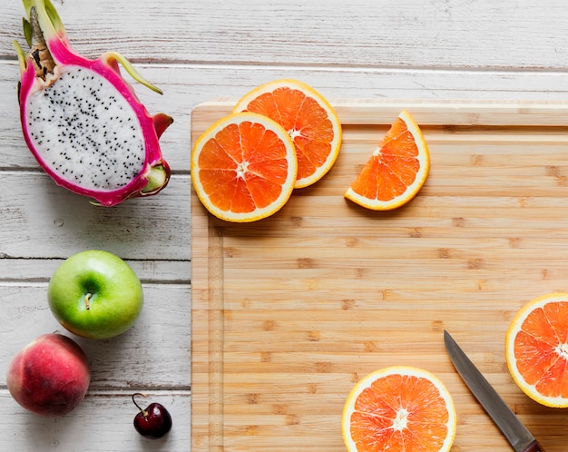 Assortment of tropical citrus fruits background