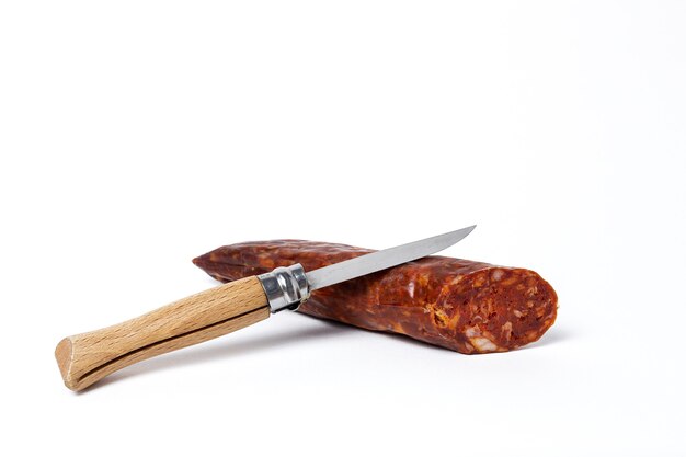 Assortment of typical Spanish homemade sausages with a colorful background. Iberian Chorizo and Salchichon