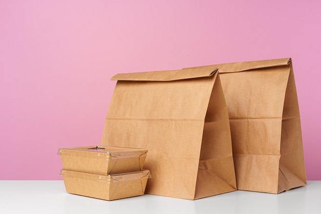 Photo assortment of various food delivery containers on table