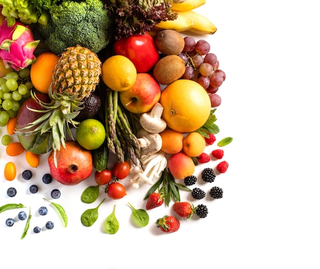 Assortment of various fresh vegetables and fruits stacked in a pile